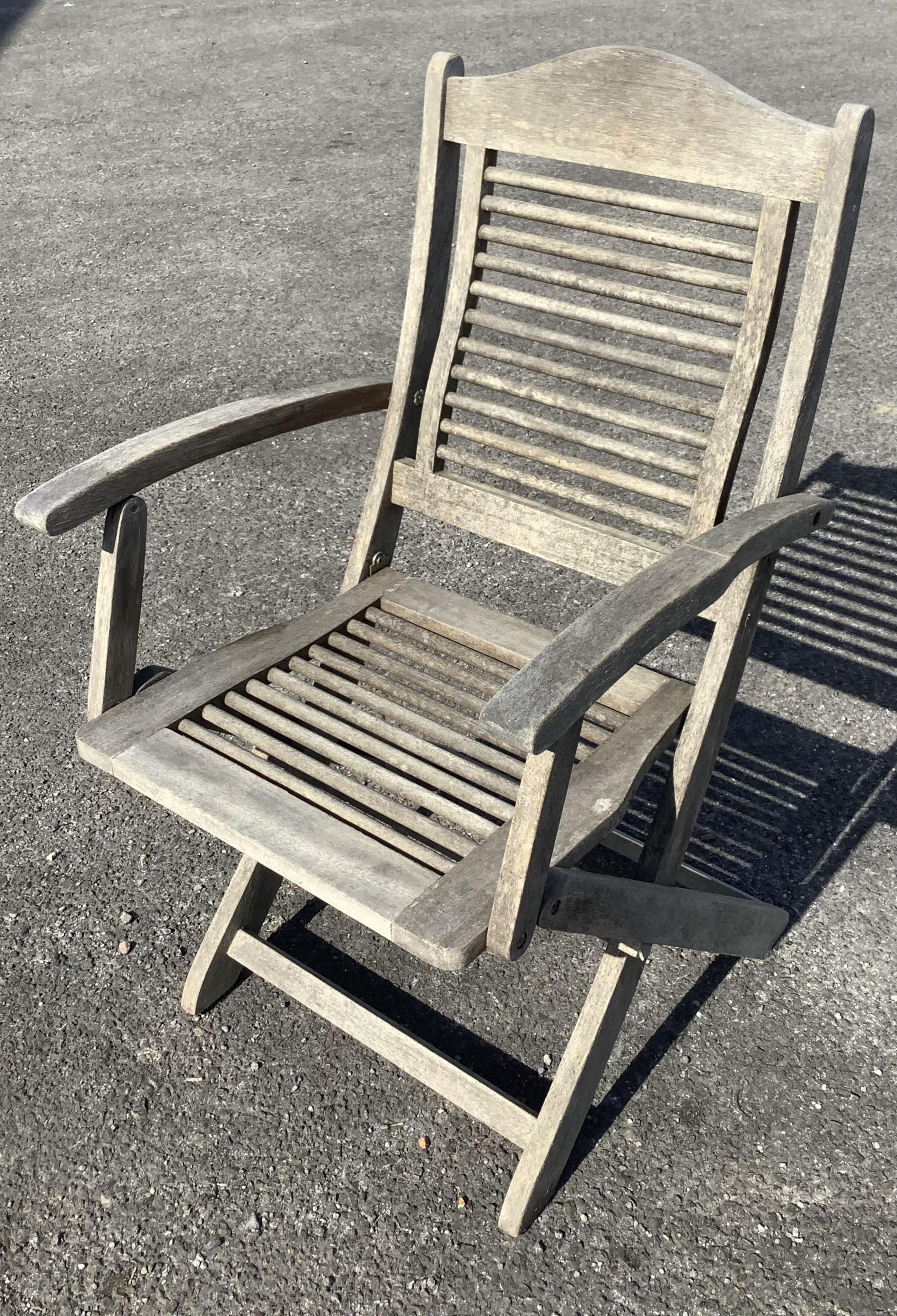 Six teak folding garden chairs by Firman and three others